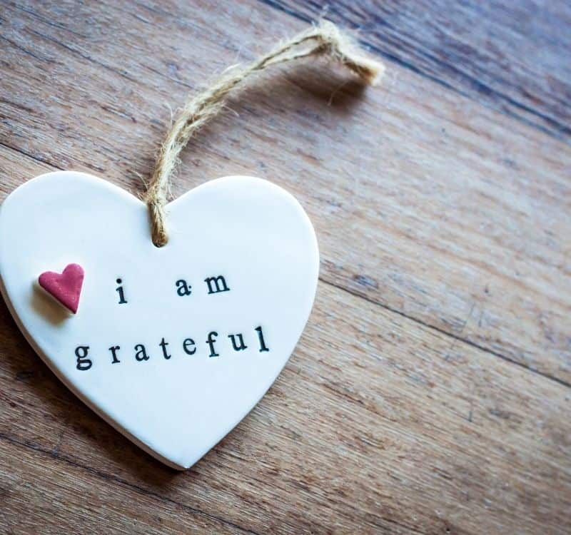 a heart token saying "i am grateful"