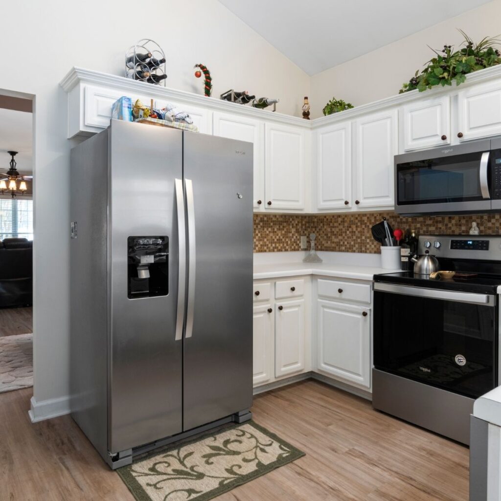 a silver fridge in a kitchen