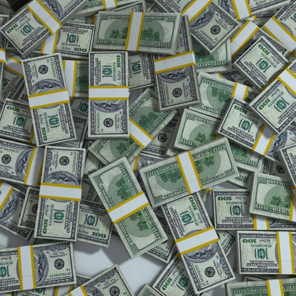 piles of $100 bills