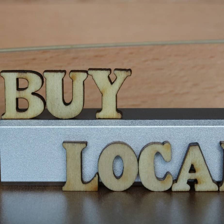 wooden carve out readying "buy local"